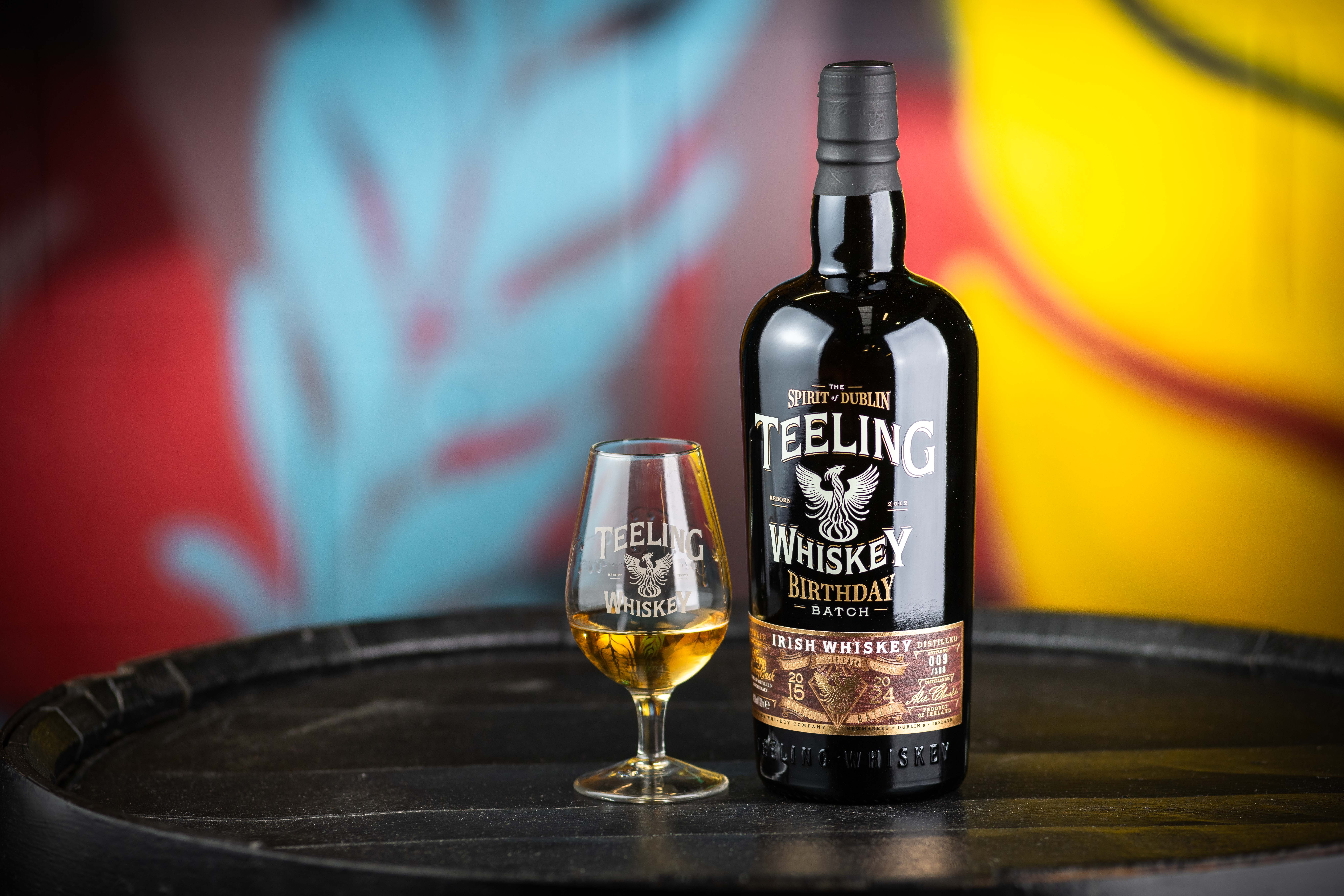 Teeling 9th Birthday Batch in front of colourful street art