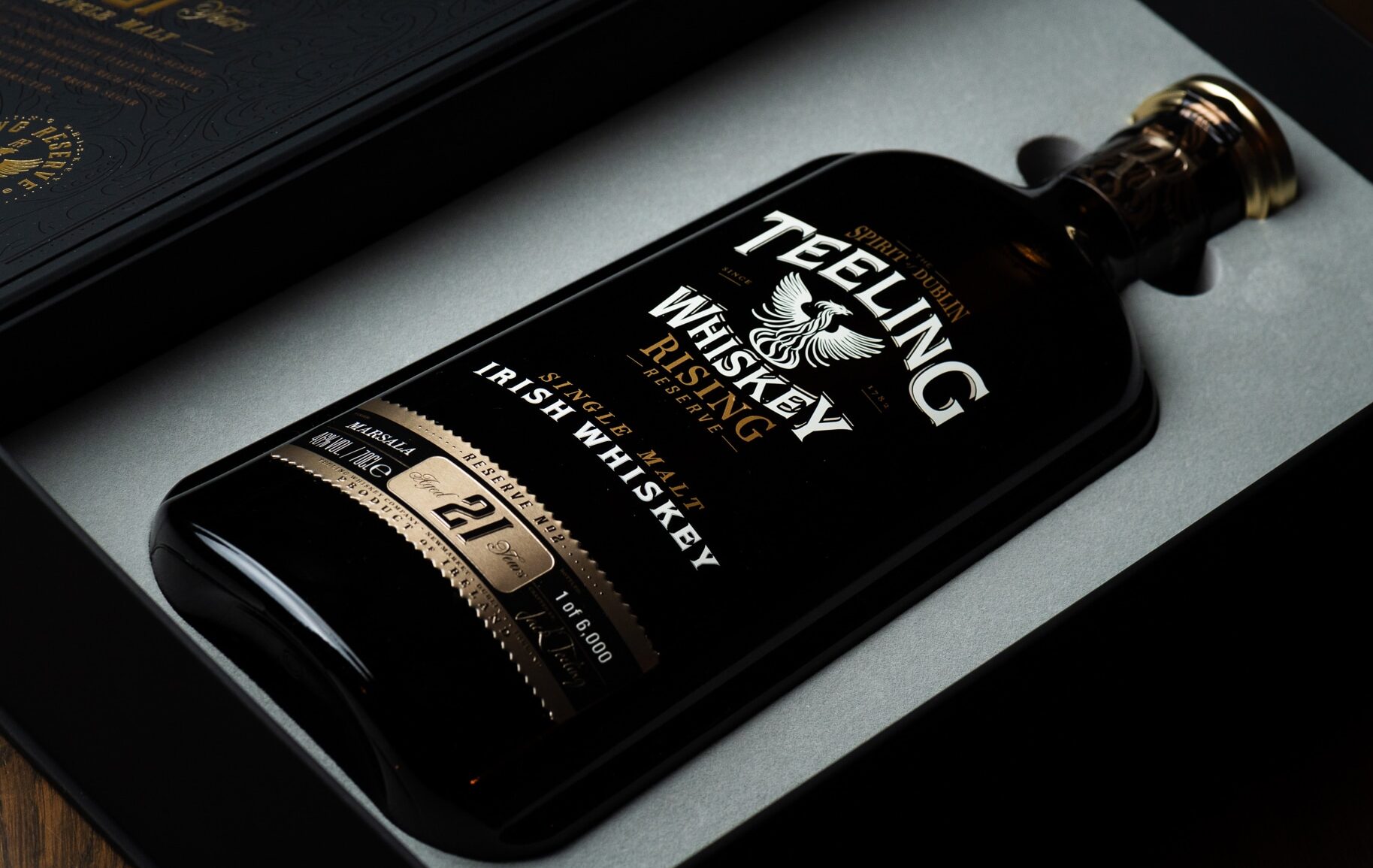 Teeling Rising Reserve 2 tilted in open box