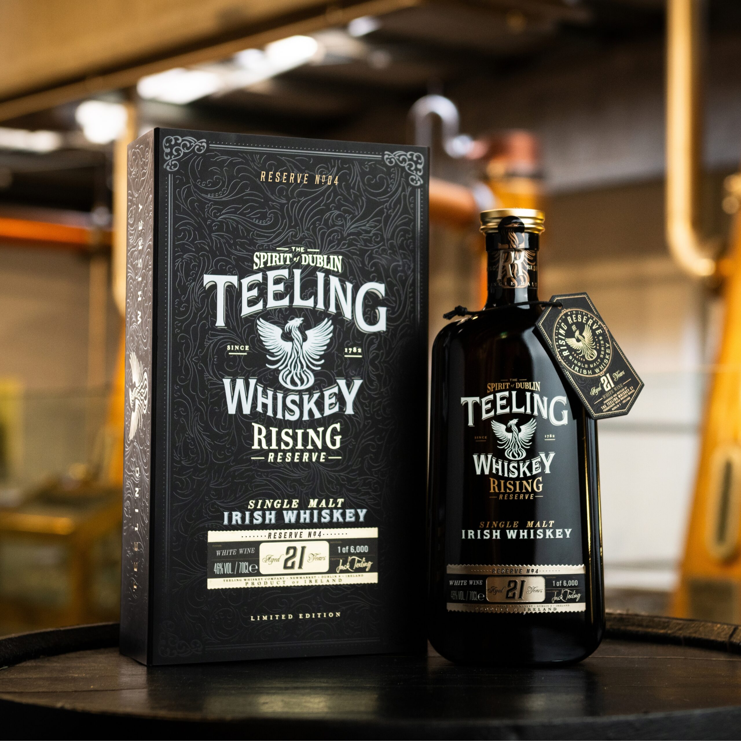 Teeling Rising Reserve Series 4 with Pot Stills in background